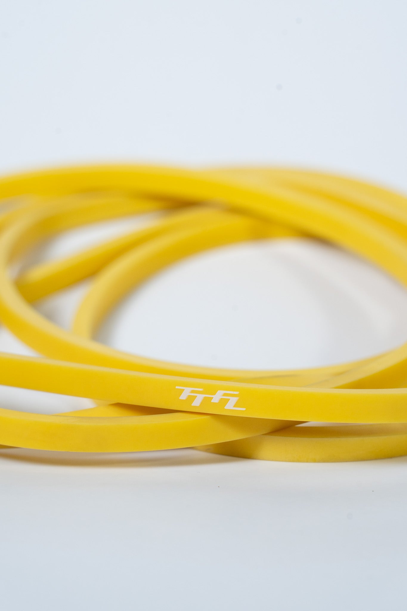 BANDA DE RESISTENCIA (2 A 7 KG) AMARILLA PARA ENTRENAMIENTO  - TTFL